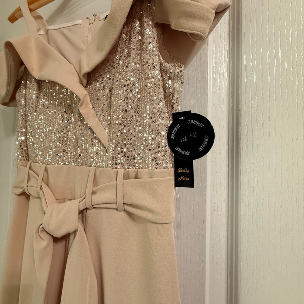 Elegant Sequin Jumpsuit with Bow Detail